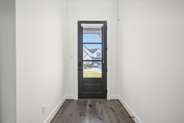 doorway to outside with hardwood / wood-style flooring