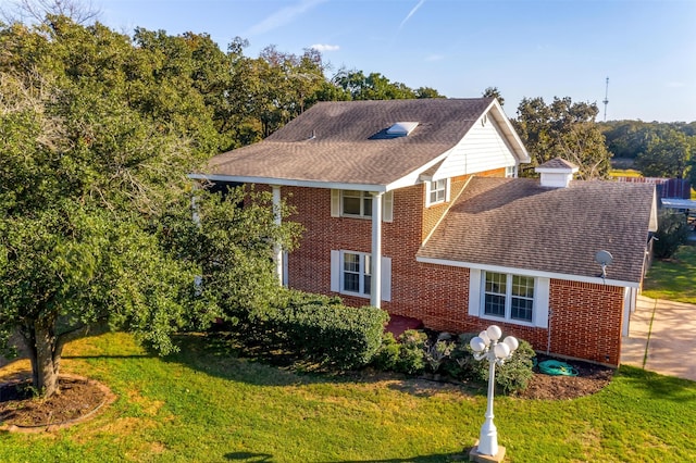 view of front of home with a front yard