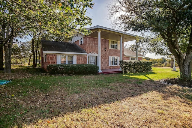 exterior space featuring a front lawn