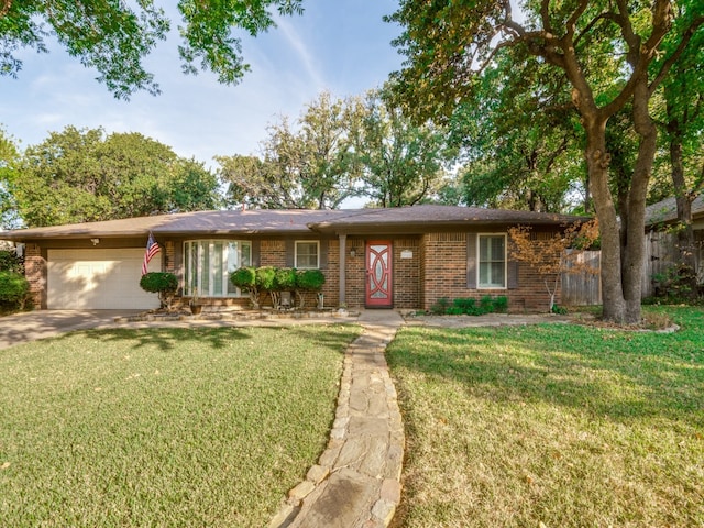 ranch-style home featuring a front lawn and a garage