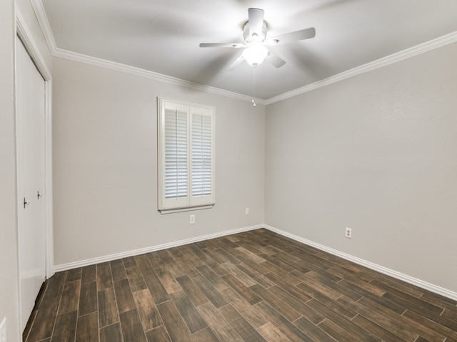 unfurnished room with ceiling fan, crown molding, and dark hardwood / wood-style floors