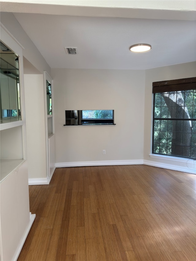 interior space with hardwood / wood-style flooring