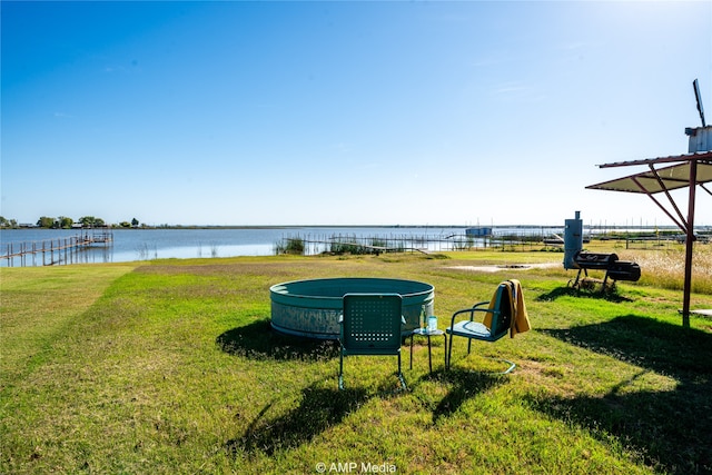 view of yard with a water view