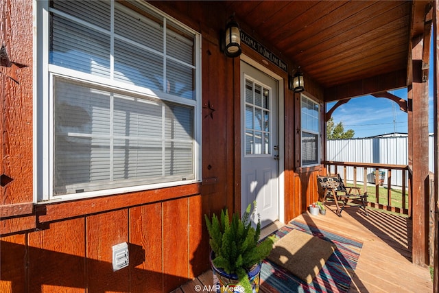 entrance to property featuring covered porch