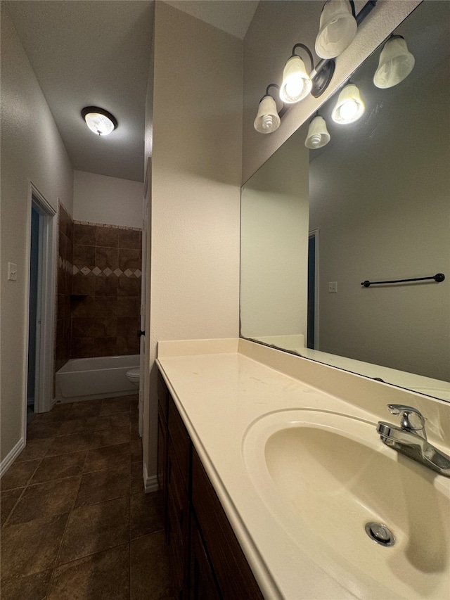 full bathroom with vanity, toilet, tile patterned flooring, and plus walk in shower