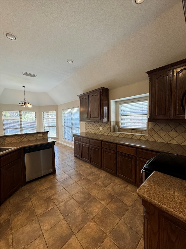 kitchen with a wealth of natural light, lofted ceiling, dishwasher, and dark brown cabinets