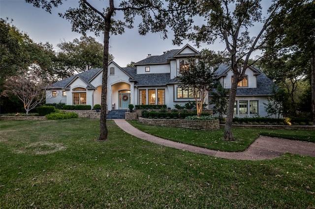 view of front of property with a front lawn