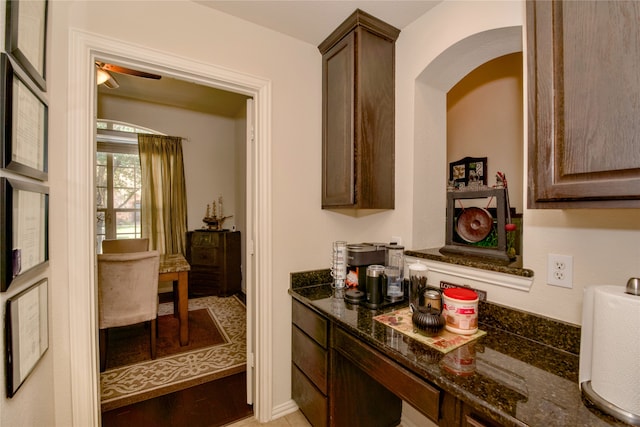 bathroom featuring hardwood / wood-style flooring and ceiling fan