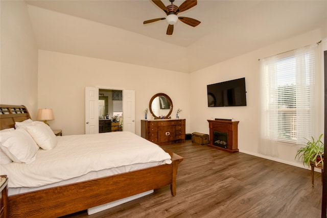 bedroom featuring ceiling fan and dark hardwood / wood-style flooring