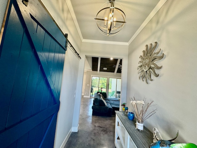 corridor featuring crown molding, a barn door, and a chandelier