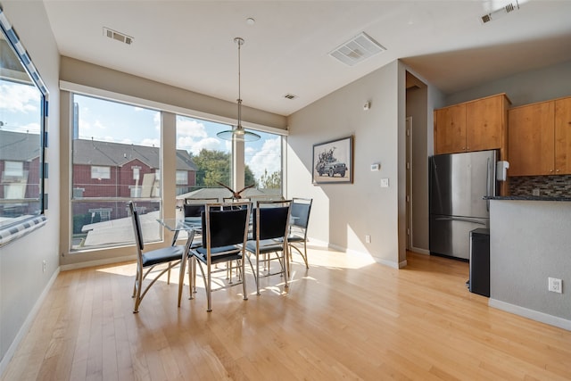 dining room featuring light wood-type flooring