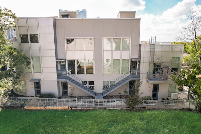959 W Bluff St Unit 105, Fort Worth, TX 76102 - view of property featuring stairs
