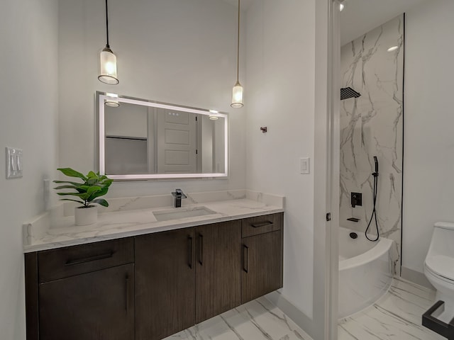 bathroom with toilet and vanity