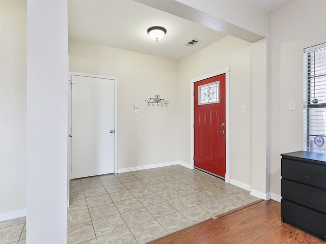 entrance foyer with light wood-type flooring