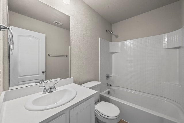 full bathroom with vanity, toilet, and shower / bath combination