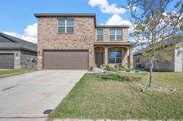 view of front facade featuring a front yard, central AC unit, and a garage