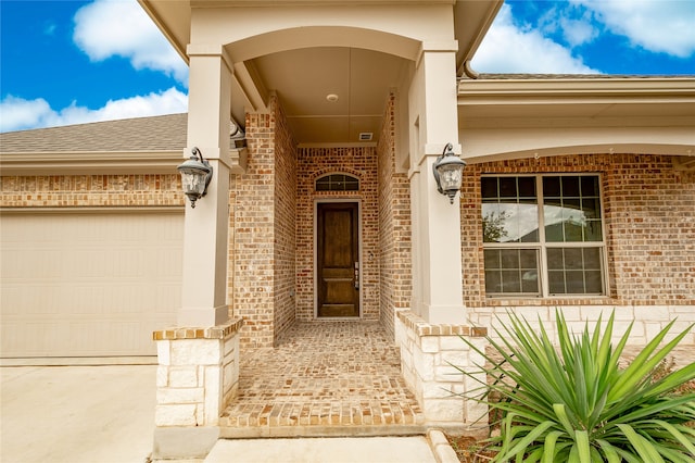 entrance to property featuring a garage