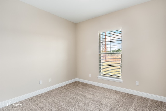 view of carpeted spare room