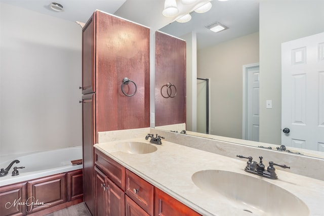 bathroom featuring vanity and plus walk in shower