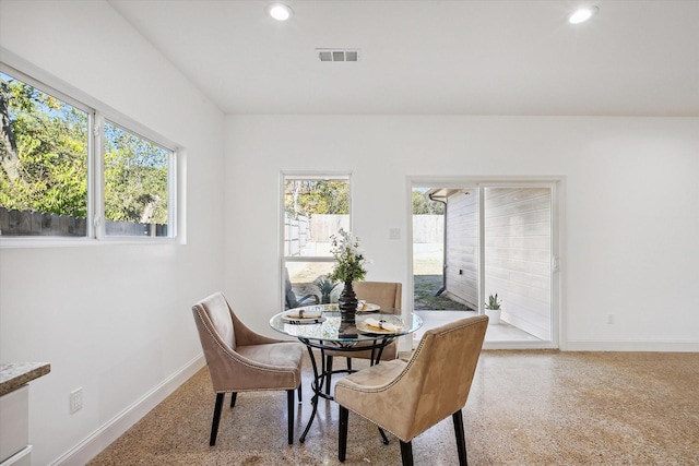 dining area featuring healthy amount of natural light, baseboards, speckle patterned floor, and recessed lighting