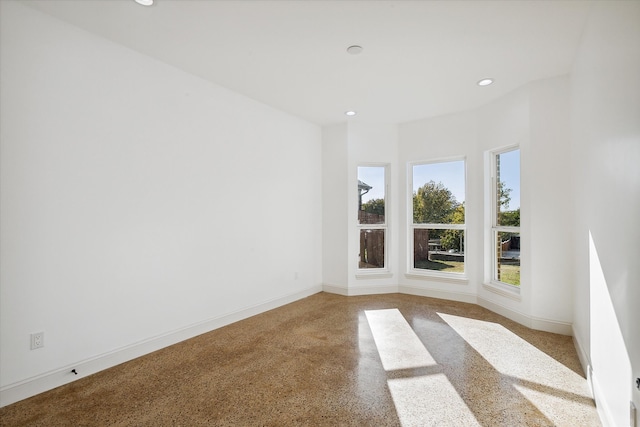 empty room featuring light carpet