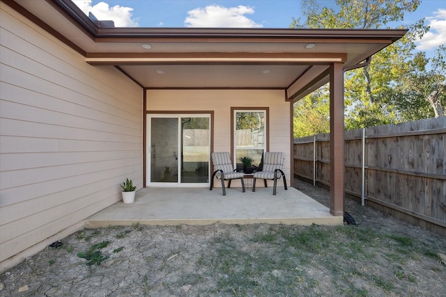 view of patio with fence