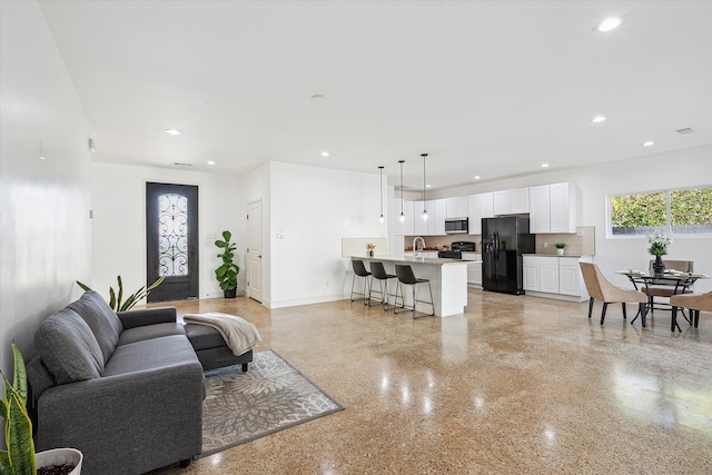 living room with sink