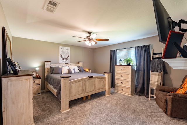 bedroom with ceiling fan and carpet flooring