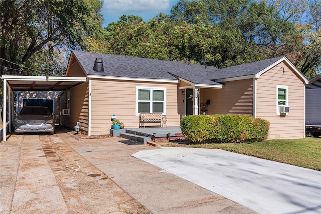 view of front of house with a carport