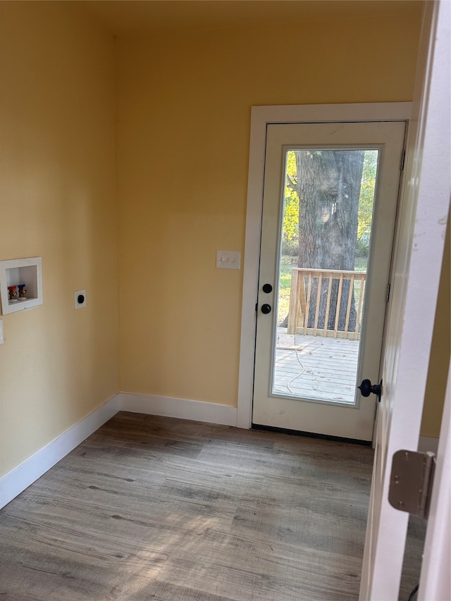 doorway with light hardwood / wood-style floors