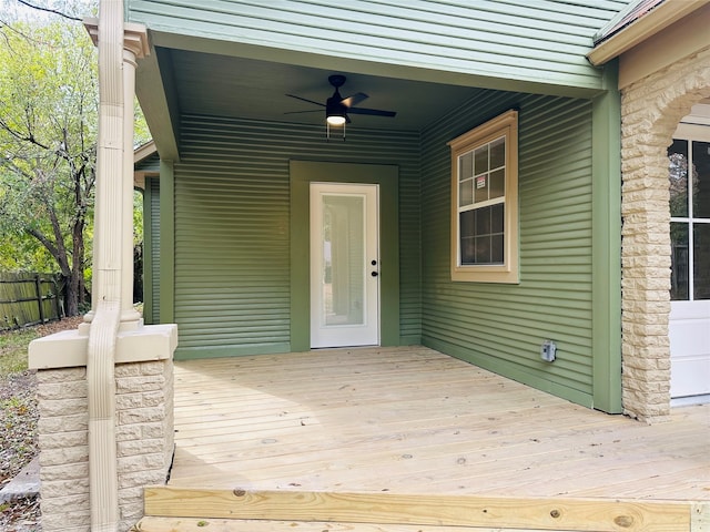 wooden terrace with ceiling fan