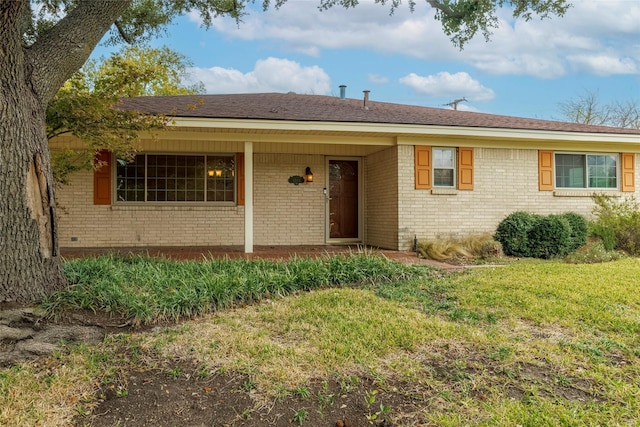 ranch-style home with a front yard