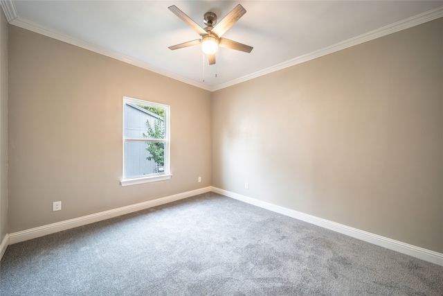 carpeted empty room with crown molding and ceiling fan