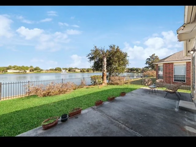 view of patio / terrace featuring a water view