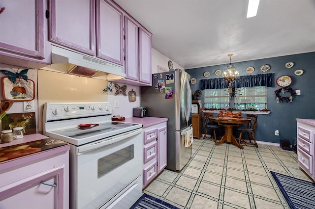 kitchen featuring stainless steel refrigerator, white electric stove, hanging light fixtures, and a notable chandelier