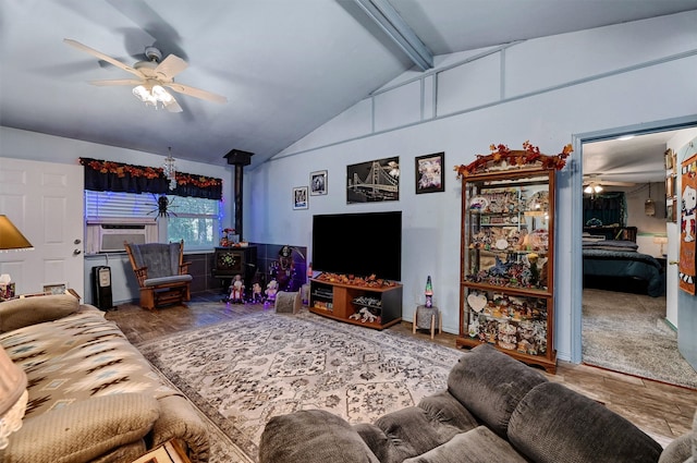 living room featuring cooling unit, ceiling fan, lofted ceiling with beams, and a wood stove