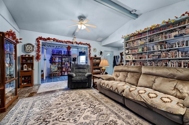 living room with lofted ceiling with beams and ceiling fan