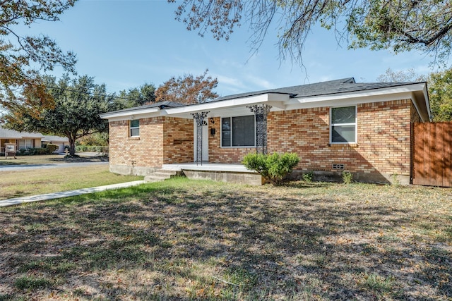 ranch-style house with a front yard