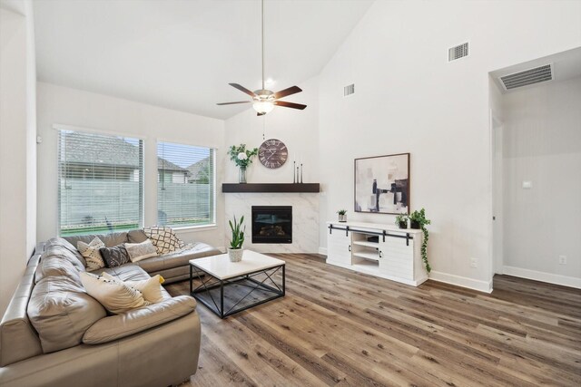 dining space with dark hardwood / wood-style flooring and an inviting chandelier