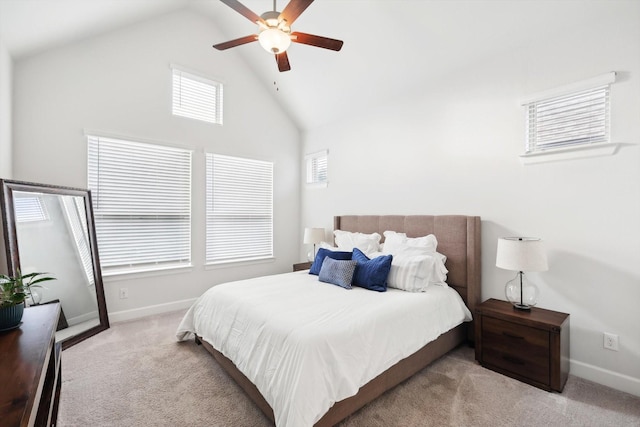 bedroom with high vaulted ceiling, baseboards, a ceiling fan, and light colored carpet