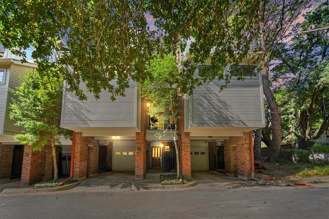 view of front of home with a carport