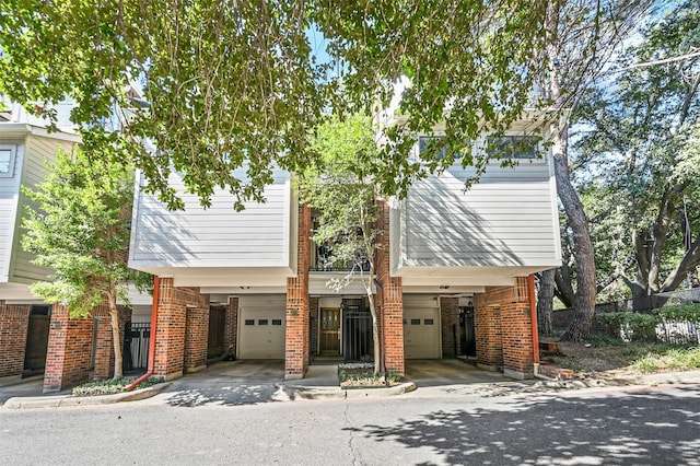 view of front facade with a carport