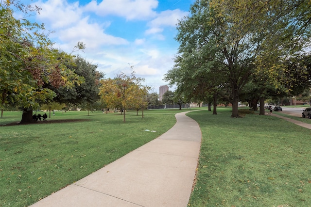 surrounding community featuring a yard