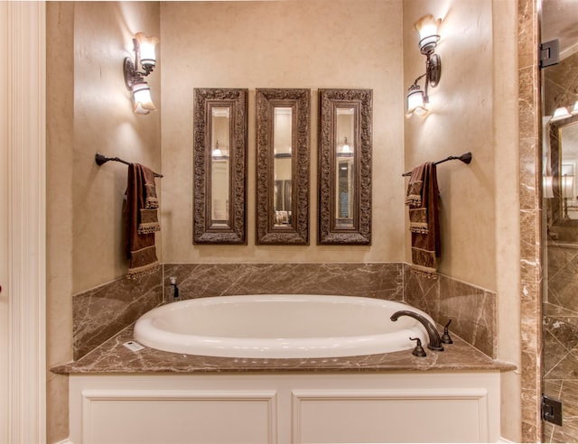 bathroom with a tub