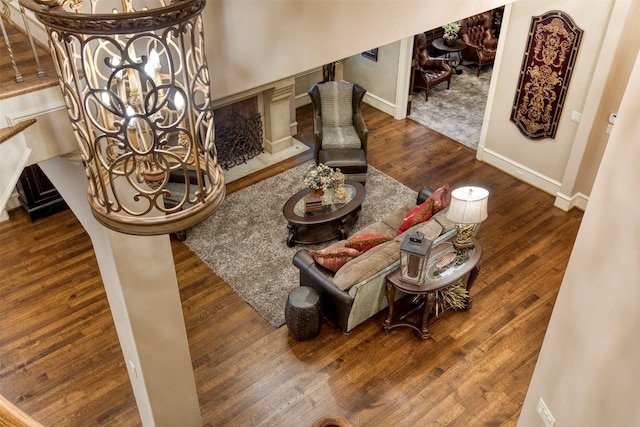 living room featuring dark wood-type flooring