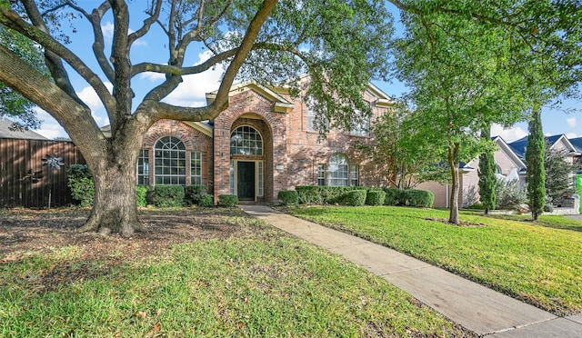 view of front of home featuring a front yard