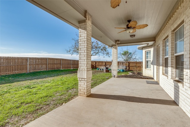 view of patio featuring ceiling fan