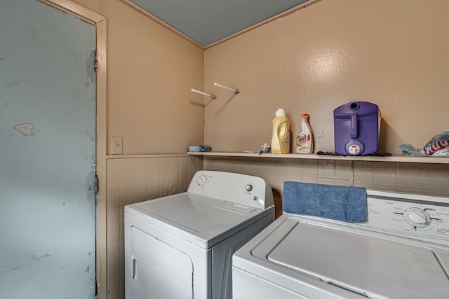 laundry area with washing machine and clothes dryer