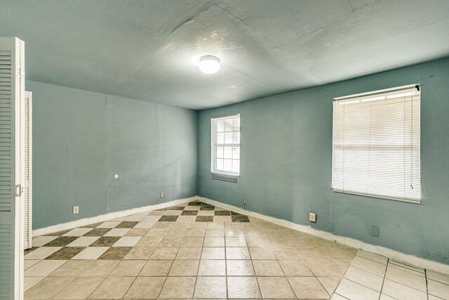 view of tiled spare room