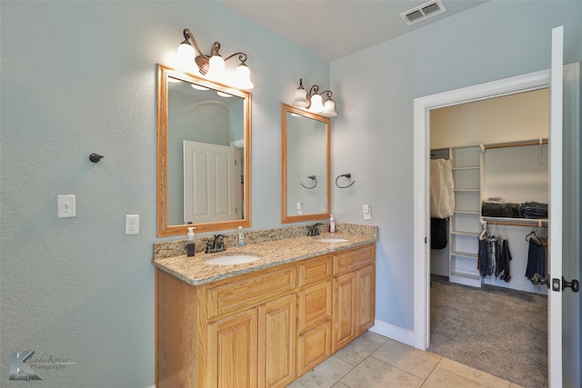 bathroom featuring vanity and tile patterned floors